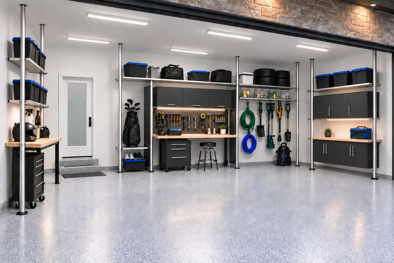 Modarsyss garage wall: floor-standing uprights carrying shelving, cabinets, a workbench and garden tools